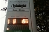 A picture of the live information bus stop flag, showing predicted arrival times