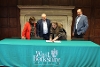 Rachel Peters, CEO of Volunteer Centre West Berkshire, signing the Memorandum of Understanding.
